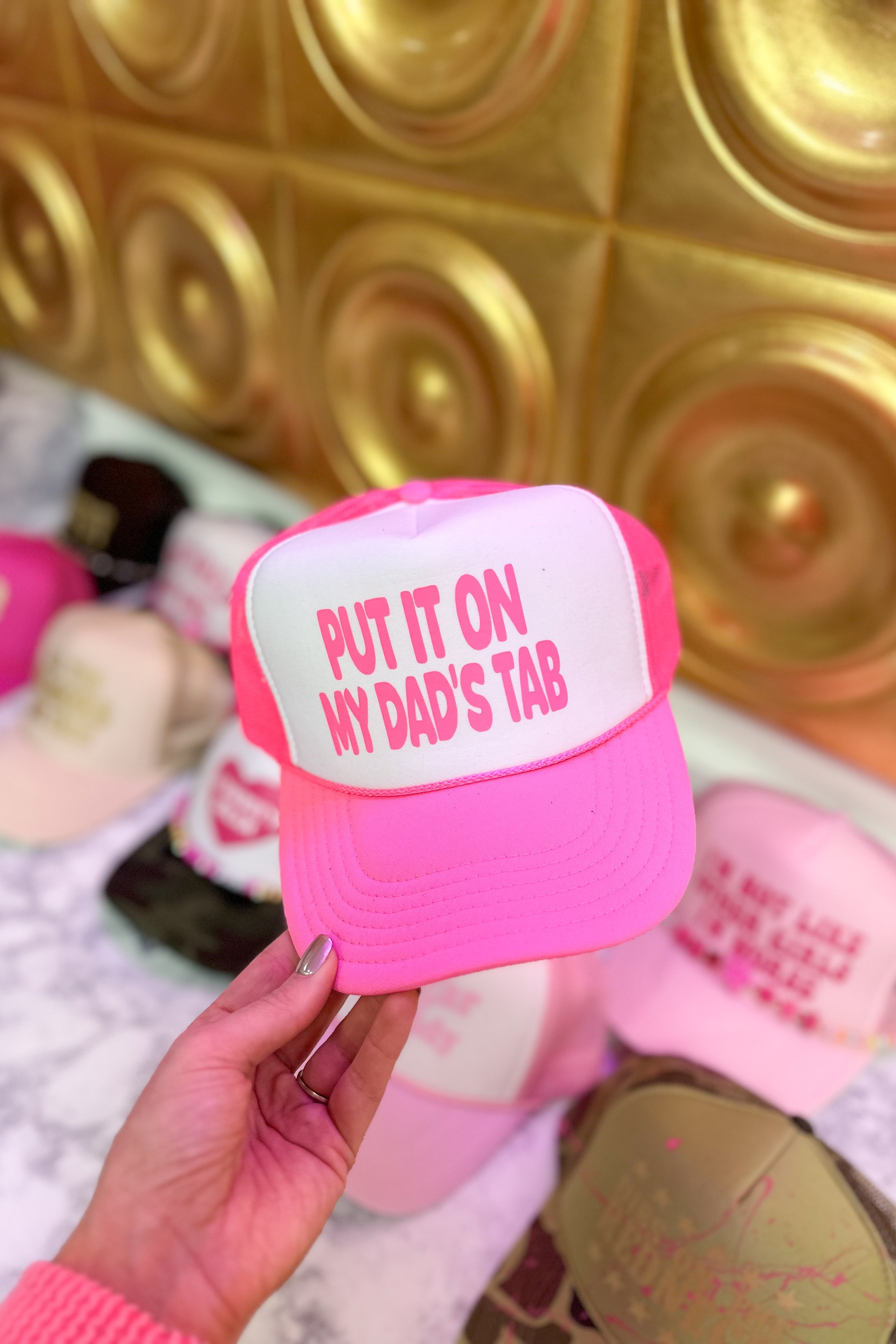 Put It On My Dad's Tab Trucker Hat