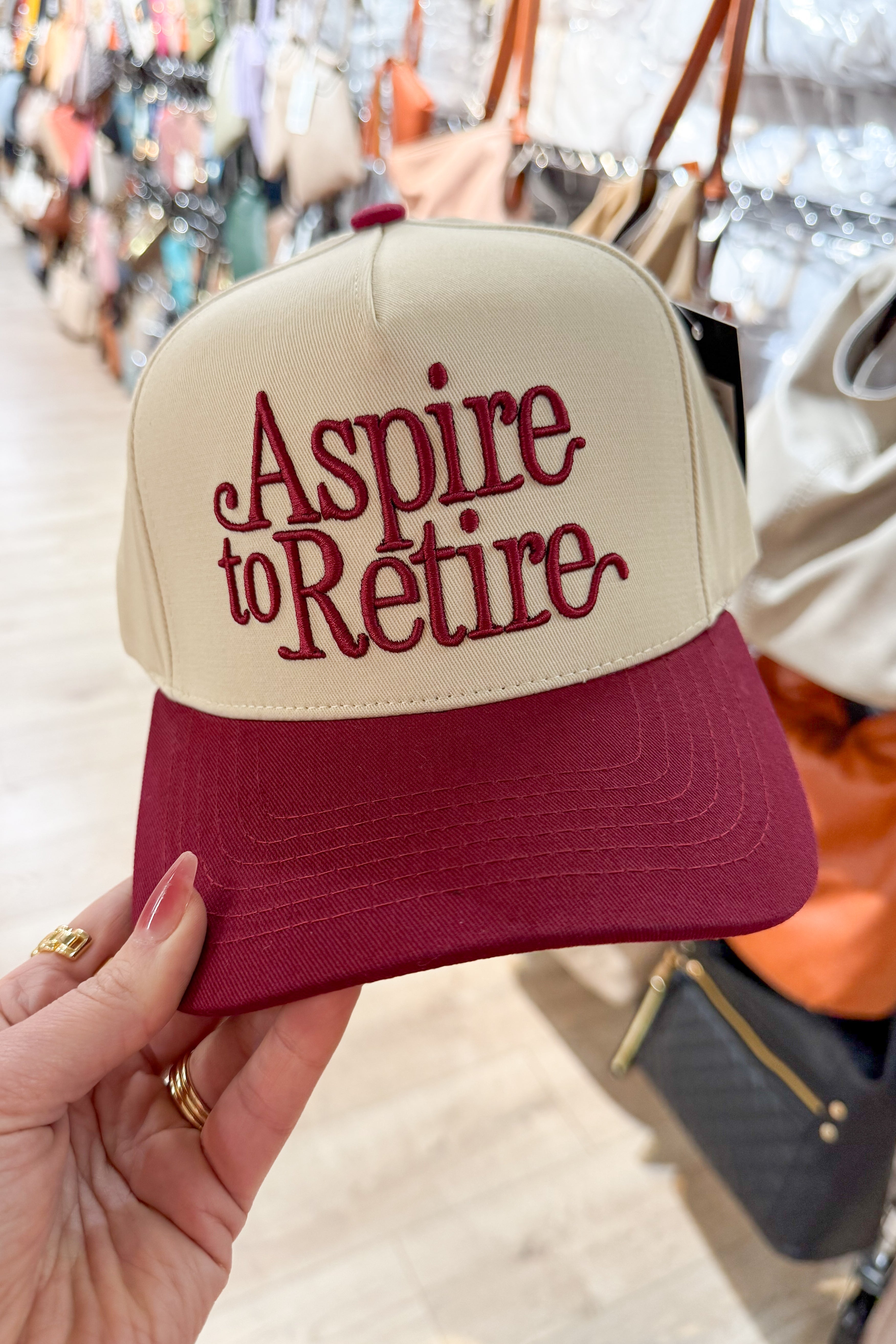 Aspire To Retire Embroidered Trucker Hat